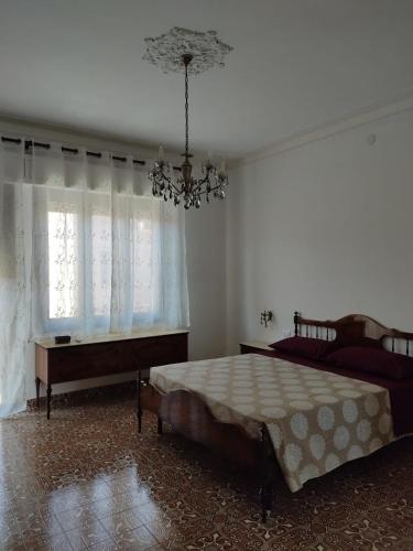 Letto o letti in una camera di La Stazione