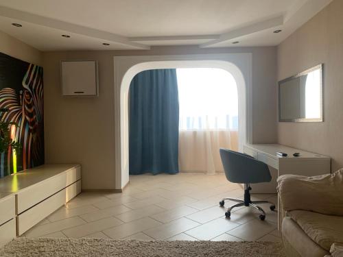 Televisyen dan/atau pusat hiburan di Cozy and comfortable apartment