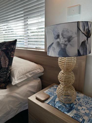 Ένα ή περισσότερα κρεβάτια σε δωμάτιο στο Tree Aloe Guest house