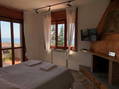 Ένα ή περισσότερα κρεβάτια σε δωμάτιο στο Verdemare, Casa & Panorama - Salerno, Amalfi Coast