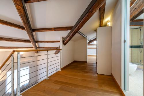 an attic hallway with wooden beams at Clock's 2 bedrms 2 baths big terrace loc13324 in Venice-Lido