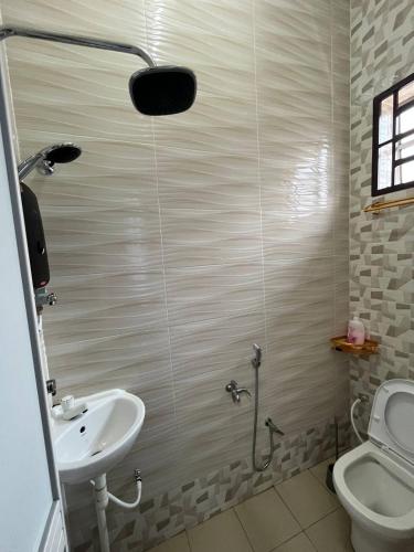 Ένα μπάνιο στο Rumah Tamu Zeha Muar Johor