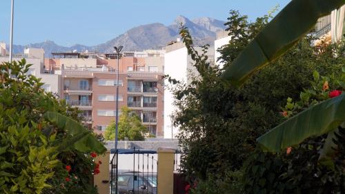 a view of a city with buildings and trees at Apartamentos StarNerja II in Nerja
