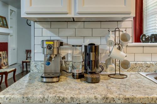 a coffee maker on a counter in a kitchen at Cozy Norman Home 4 Mi to Oklahoma University! in Norman