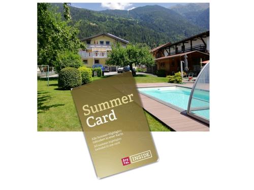 a sign for a summer card in front of a house at Haus Monika in Oetz