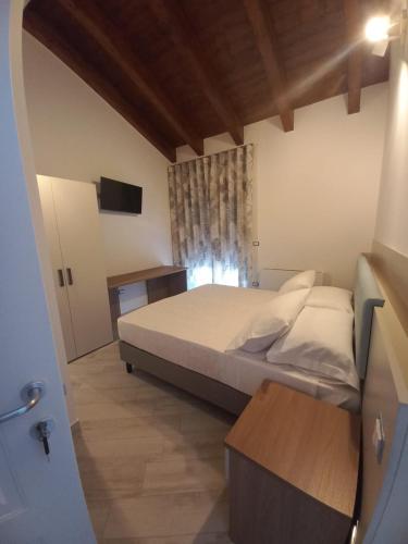 Postel nebo postele na pokoji v ubytování Il Riccio home & relax