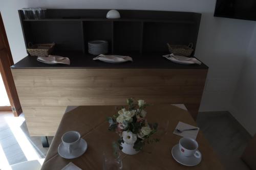 Příslušenství pro přípravu čaje a kávy v ubytování Il Riccio home & relax