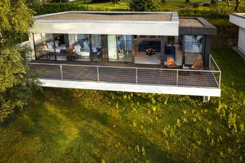 an overhead view of a house with a lawn at Lemon Resort Spa in Gródek Nad Dunajcem