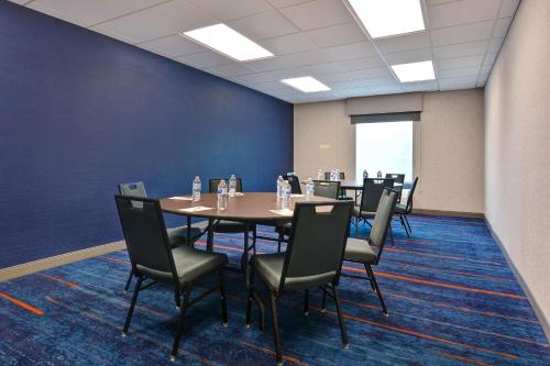 a conference room with a table and chairs at Hampton Inn & Suites Clearwater St Petersburg Ulmerton Road FL in Clearwater