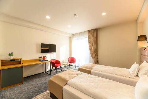 Hotel DUKATにあるテレビまたはエンターテインメントセンター