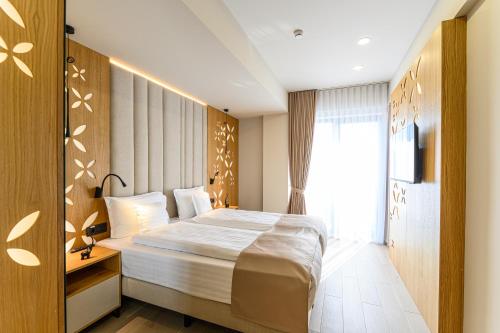 Hotel DUKATにあるベッド