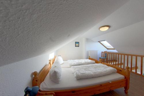 Postel nebo postele na pokoji v ubytování LM5-16 "Över`n Diek"