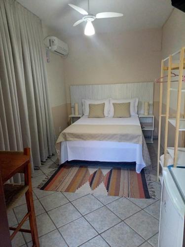 Postel nebo postele na pokoji v ubytování Pousada Estrela Mares