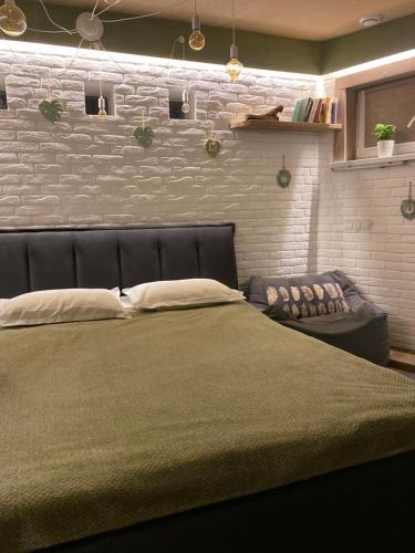 Letto o letti in una camera di Dobri Dom