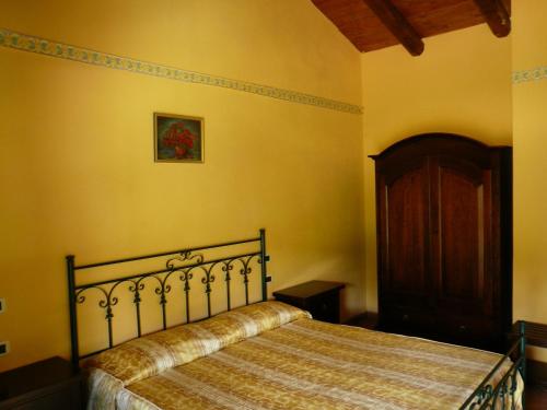 Postel nebo postele na pokoji v ubytování Hotel Borgo Antico