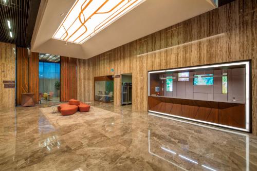 TV a/nebo společenská místnost v ubytování Hilton Garden Inn Istanbul Atatürk Airport