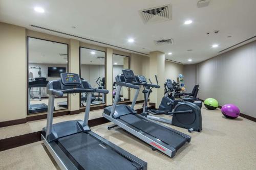 a gym with several tread machines in a room at Hilton Garden Inn Safranbolu in Safranbolu