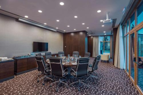 a conference room with a table and chairs at Hilton Garden Inn Safranbolu in Safranbolu