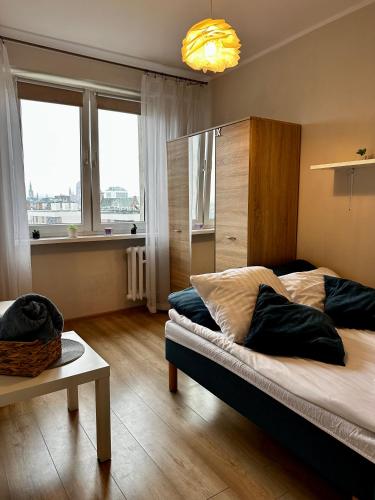 Postel nebo postele na pokoji v ubytování Gdańsk Old Town Apartment