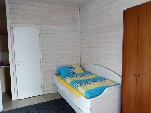 Postel nebo postele na pokoji v ubytování Rekreační chatka / Tiny House