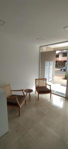 Uma área de estar em Villa Sarita 3D