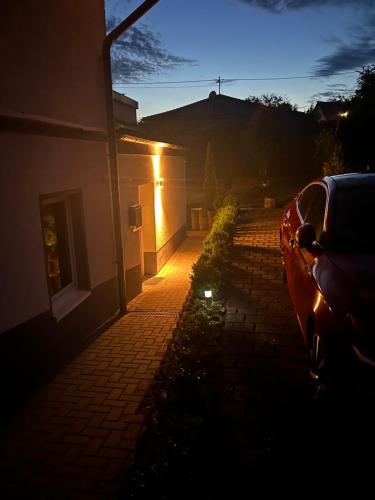 a car parked in front of a house at night at Ferienwohnung Nähe Montabaur "Im Herzen des Westerwalds" 