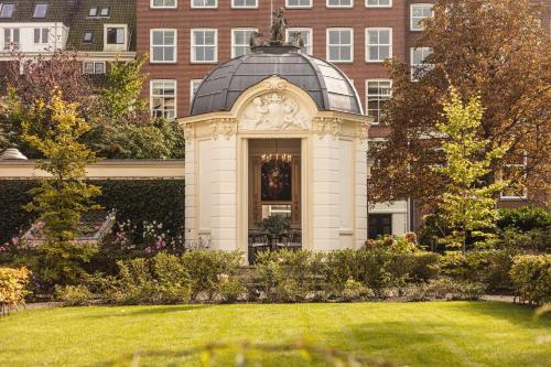 a gazebo in front of a building at Waldorf Astoria Amsterdam in Amsterdam