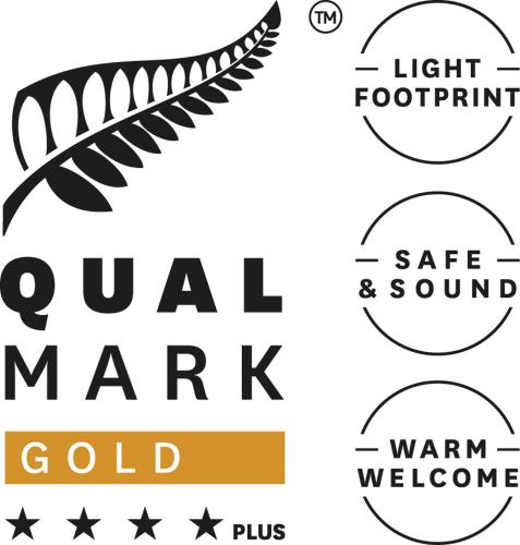 a set of logos for a cold market with a feather at Camp Waipu Cove in Waipu
