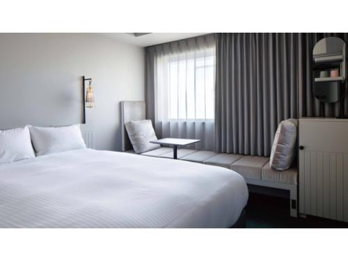 HOTEL TORIFITO KANAZAWA - Vacation STAY 07262v房間的床