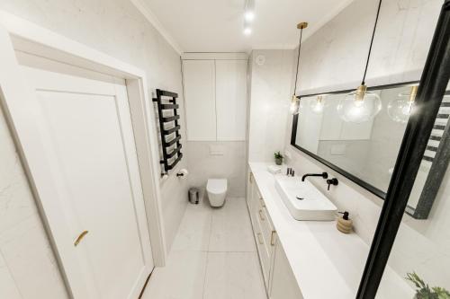 Ένα μπάνιο στο Aparthotel Plac Litewski Premium