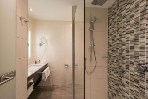 Phòng tắm tại Hilton Garden Inn Munich City West