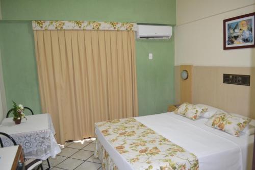 Katil atau katil-katil dalam bilik di Yak Beach Hotel Ponta Negra