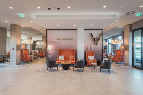Area soggiorno di Hampton By Hilton Freiburg