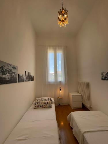 Ένα ή περισσότερα κρεβάτια σε δωμάτιο στο Casa Linda