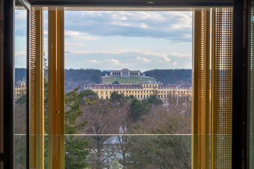 a window with a view of a building at Doubletree by Hilton Vienna Schonbrunn in Vienna