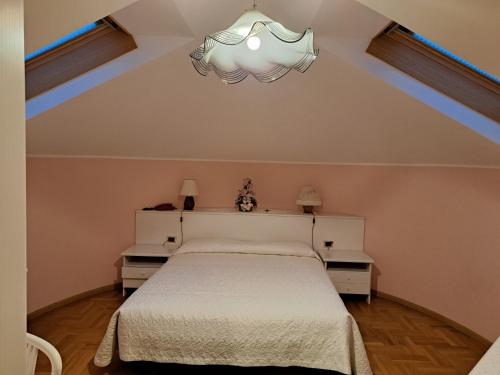 Postel nebo postele na pokoji v ubytování Hotel Mirage