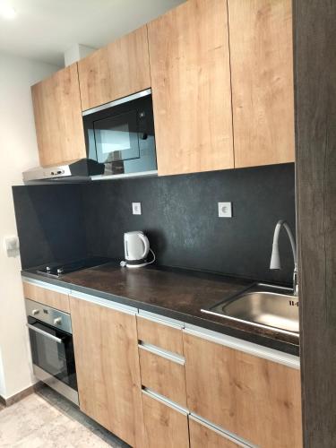 Una cocina o zona de cocina en Horizont