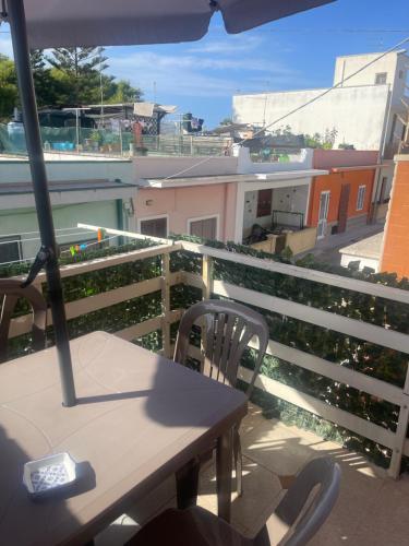a table and chairs on a balcony with a view at Dimora Agnese in Casalabate
