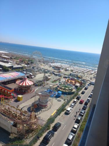 an aerial view of an amusement park with a roller coaster at Garsoniera Panoramic in Năvodari
