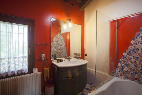 a bathroom with a sink and a shower and a tub at La Villa delle Rose near Venice in Trebaseleghe