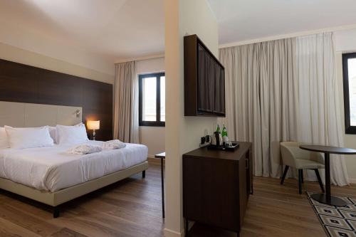 DoubleTree by Hilton Bresciaにあるベッド