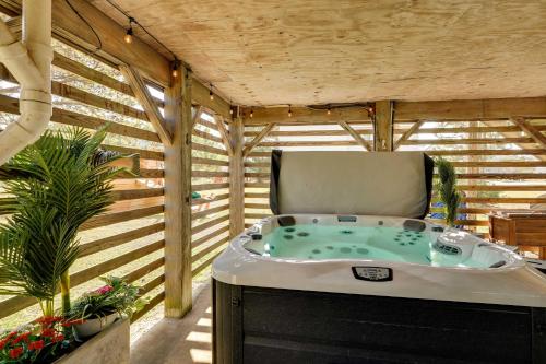 a jacuzziificialificialificialificialificialificialificialificialificialificialificial at Hot Tub, Pirate Fort and Fire Pit Outer Banks Home! in Nags Head