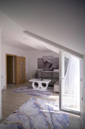 Postel nebo postele na pokoji v ubytování Luxury Apartments Milićević