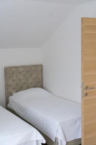 Postel nebo postele na pokoji v ubytování Luxury Apartments Milićević