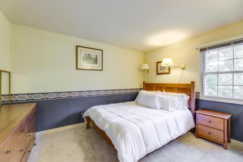 Un dormitorio con una cama grande y una ventana en Family-Friendly West Chester Twp Home with Pool!, en West Chester
