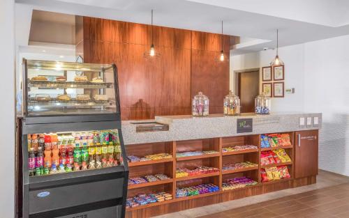 a store with a display of food and drinks at Hampton Inn & Suites by Hilton Los Cabos in San José del Cabo
