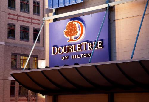 a sign on the side of a building at DoubleTree by Hilton Hotel Boston - Downtown in Boston