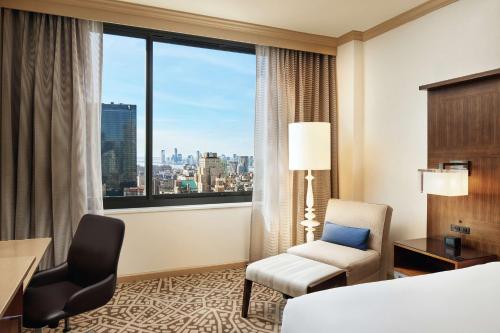 Cama ou camas em um quarto em Hilton New York Times Square