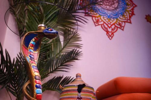 a figurine of a lizard hanging from a plant at Hilton New York Times Square in New York