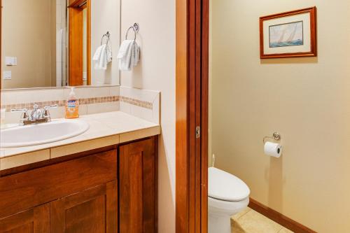 a bathroom with a sink and a toilet at Vista Azul in Oceanside